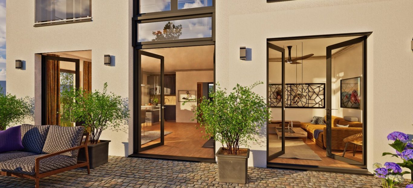 Ruhige, moderne Terrasse mit Sitzgelegenheiten und offenem Übergang zu einem warm gestalteten Innenraum.